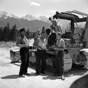Daily work in a construction area, Germany 1950s. Daily work in a construction area, Germany 1950s.